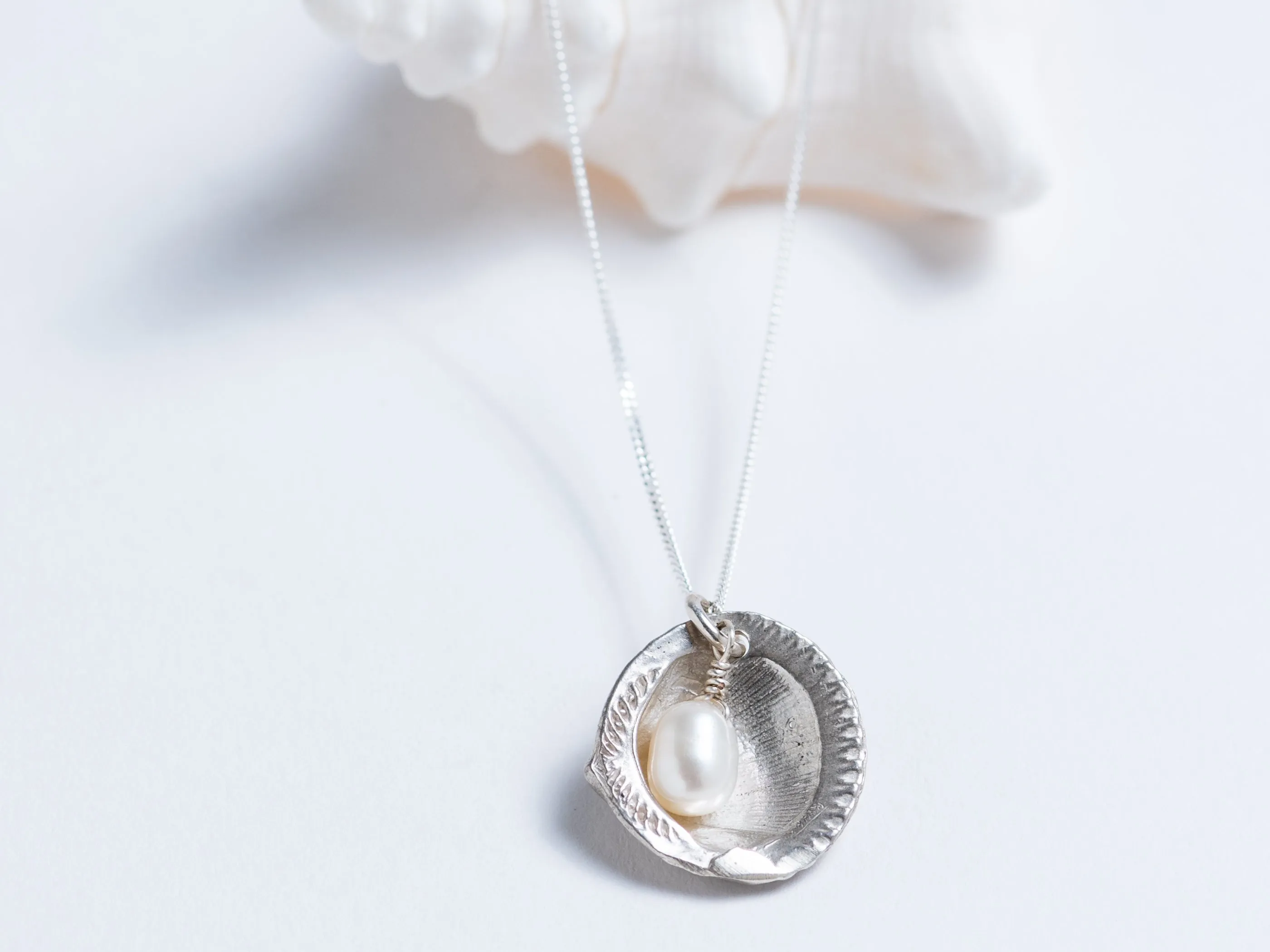 Cast Shell with Pearl Pendant